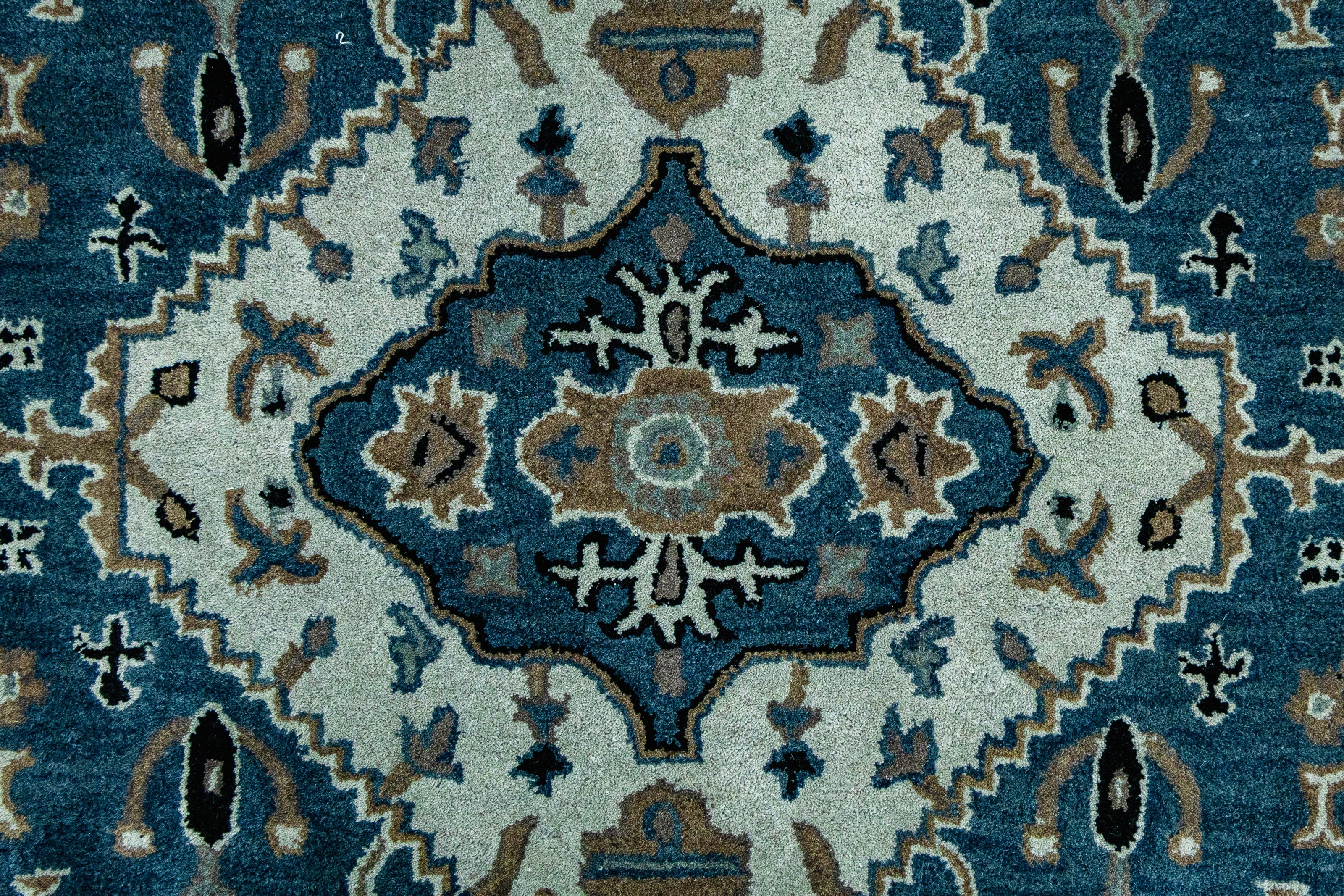 Close-up of Hand-Tufted Woolen Handmade Area Rug for bed rooms, offices, and dining spaces