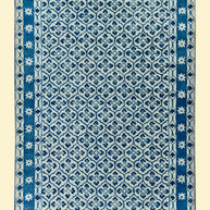 Blue and White Patterned Hand-Tufted Woolen Handmade Rug for bed rooms, offices, and dining spaces. 