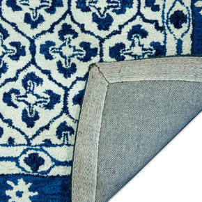 Detail  Shot of Blue and White Patterned Hand-Tufted Woolen Handmade Rug for bed rooms, offices, and dining spaces. 