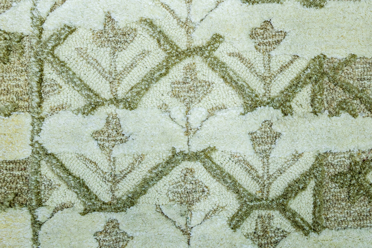 Detail Shot of Luxury Ivory/Cream Hand-Tufted Woolen Rug for bed rooms, offices, and dining spaces with Geometric Pattern