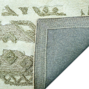 Detail Shot of Luxury Ivory/Cream Hand-Tufted Woolen Rug for bed rooms, offices, and dining spaces with Geometric Pattern