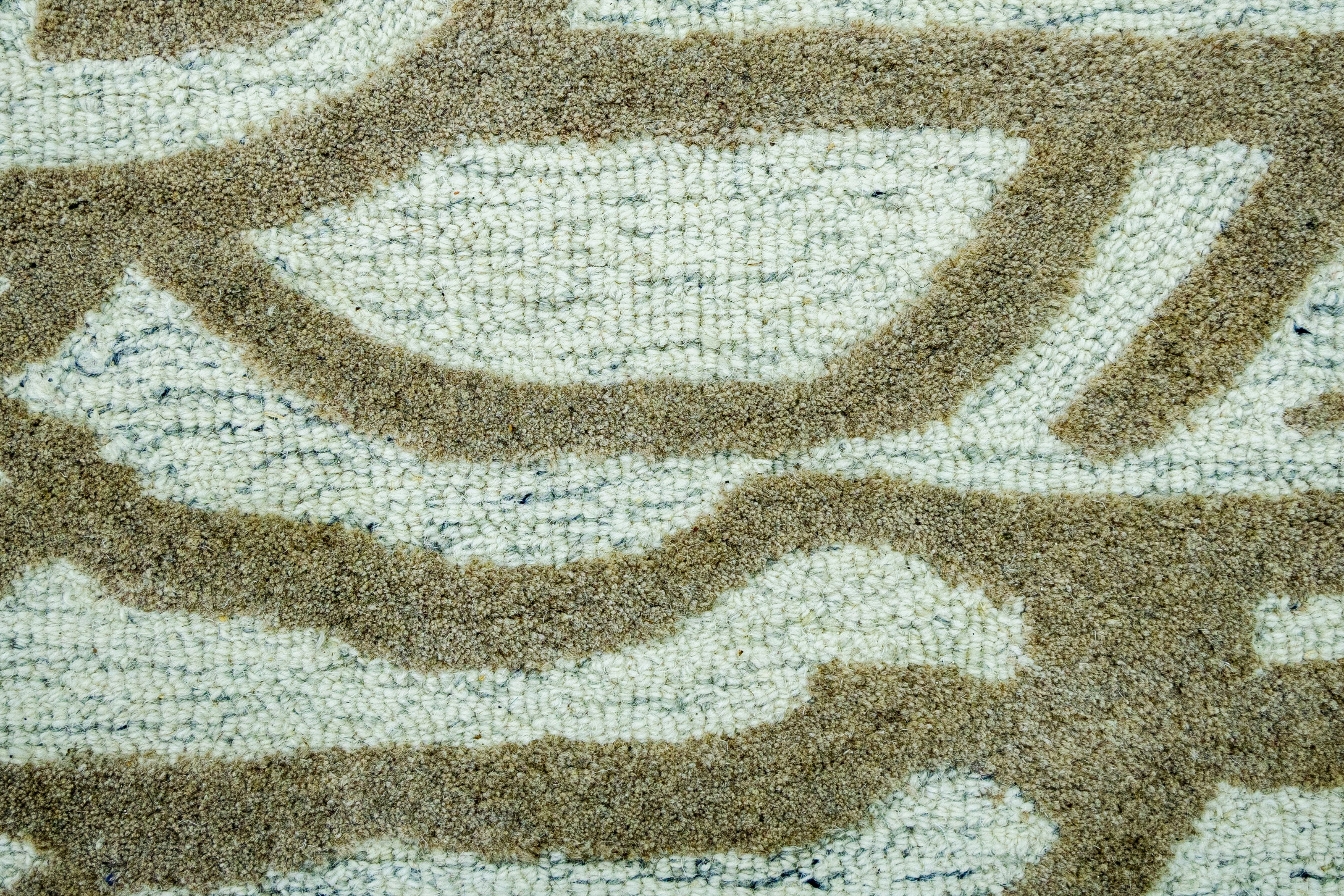 Detail Shot of Hand-Tufted Woolen Handmade Rug for bed rooms, offices, and dining spaces. with Wavy Pattern