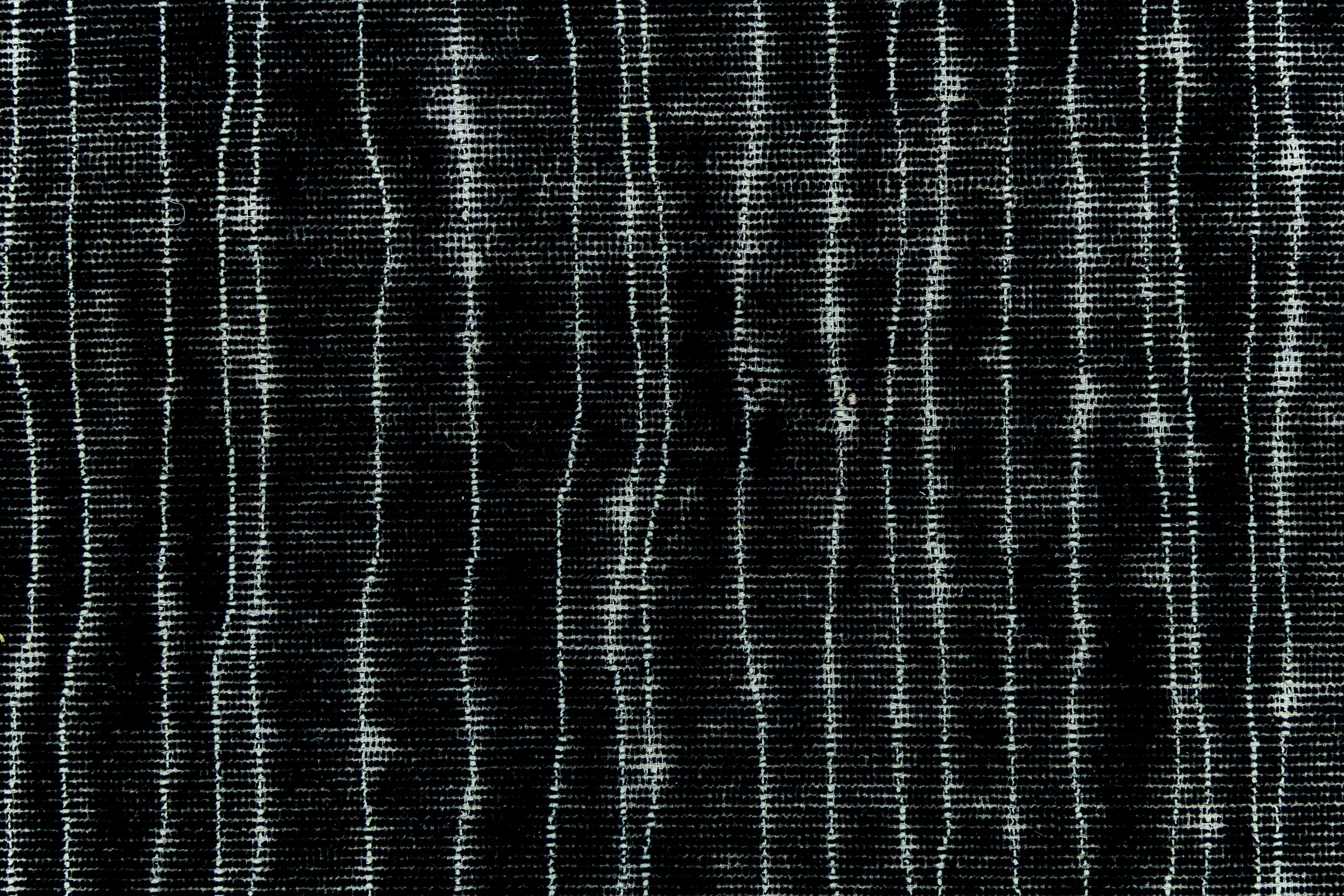 Detail shot of Hand-Tufted Woolen Handmade Rug for bed rooms, offices, and dining spaces. 