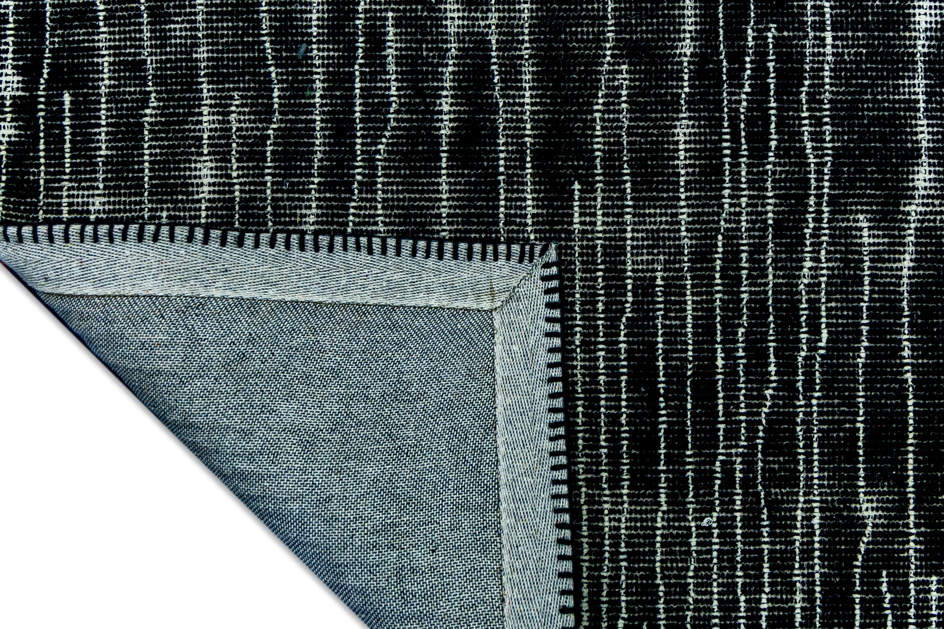 Detail Shot of Hand-Tufted Woolen Handmade Rug for bed rooms, offices, and dining spaces. 