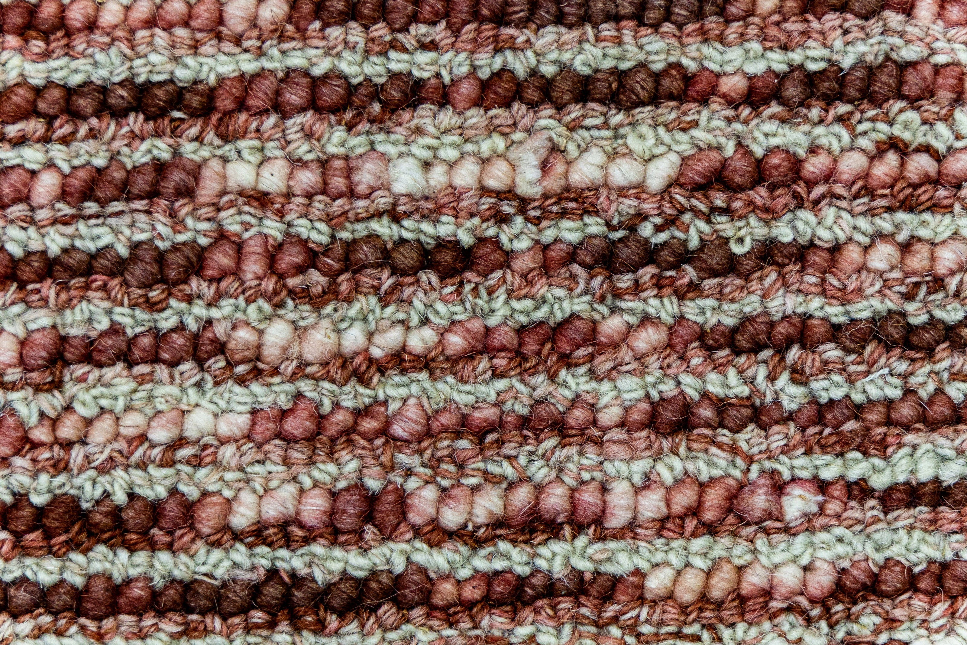 Detail shot of Textured Hand-Tufted Woolen Handmade Rug for bed rooms, offices, and dining spaces. 