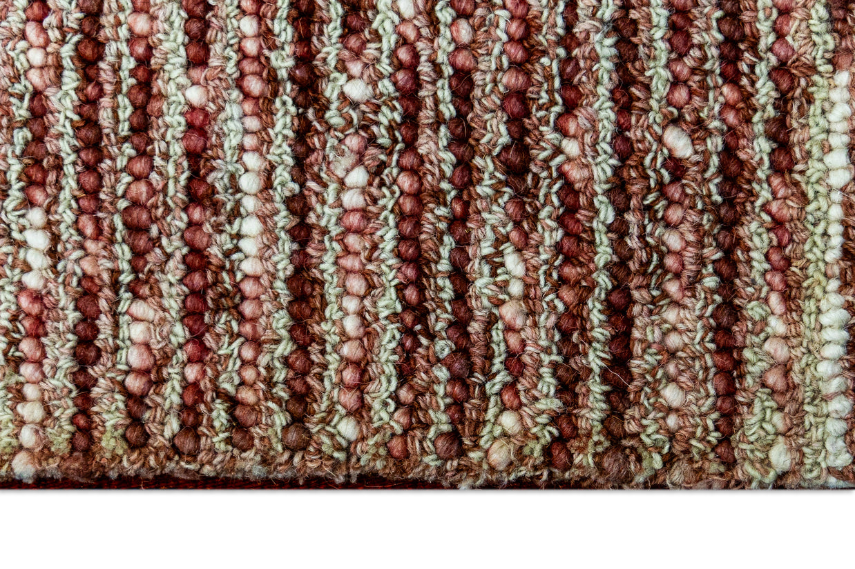 Detail shot of Textured Hand-Tufted Woolen Handmade Rug for bed rooms, offices, and dining spaces. 