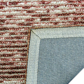 Detail of Detail shot of Textured Hand-Tufted Woolen Handmade Rug for bed rooms, offices, and dining spaces. 