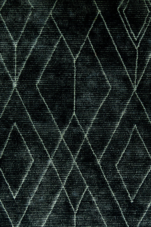 Detail Shot of Black Hand-Tufted Woolen Handmade Rug for bed rooms, offices, and dining spaces.