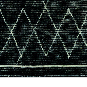 Detail Shot of Black Hand-Tufted Woolen Handmade Rug for bed rooms, offices, and dining spaces.