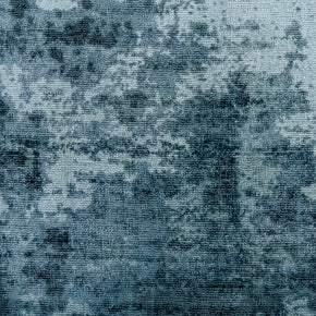 Detail shot of Blue Textured Hand-Loom Printed Viscose Handmade Rug for bed rooms, offices, and dining spaces.