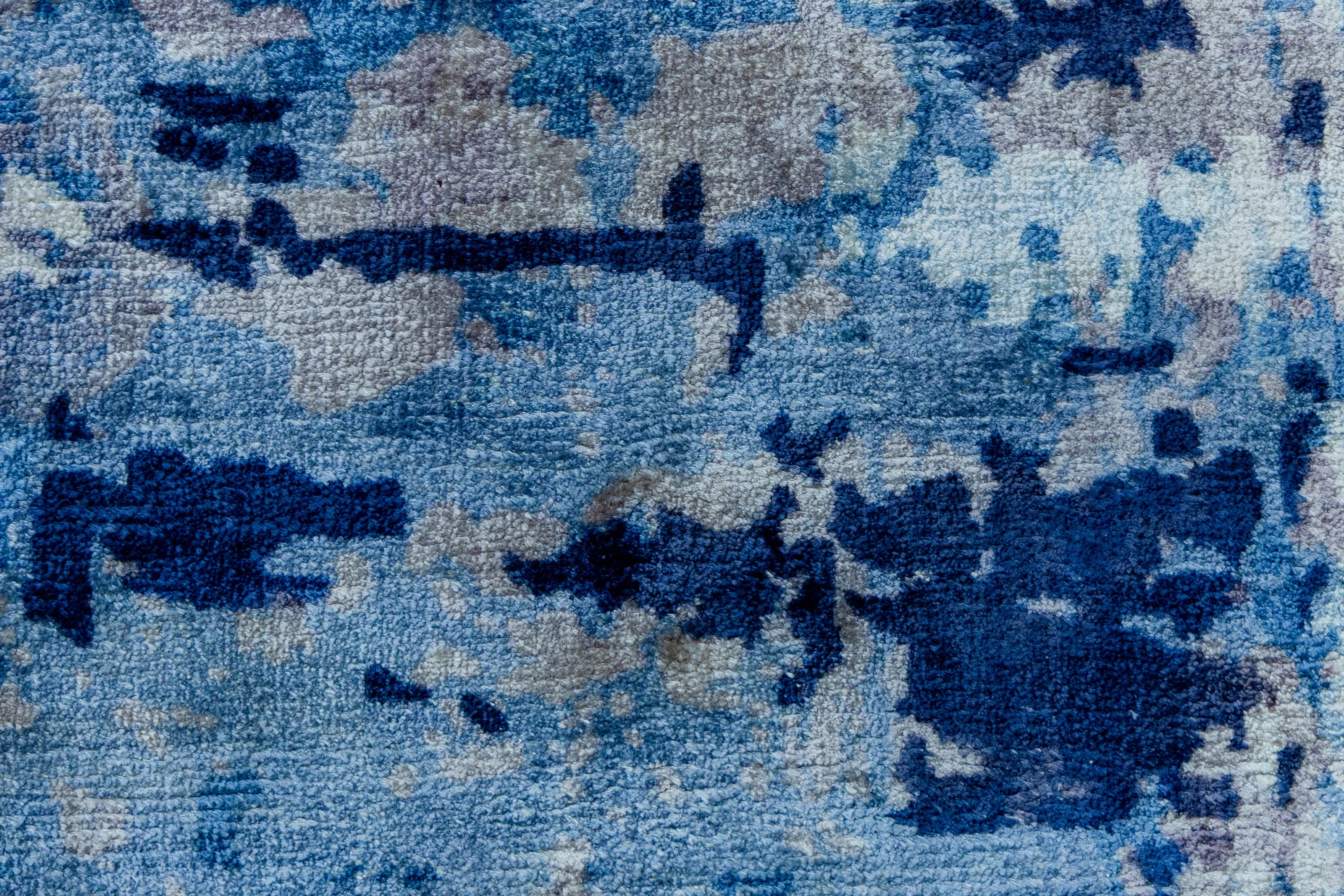 Detail Shot of Blue Hand-Loom Printed Viscose Handmade Rug for bed rooms, offices, and dining spaces