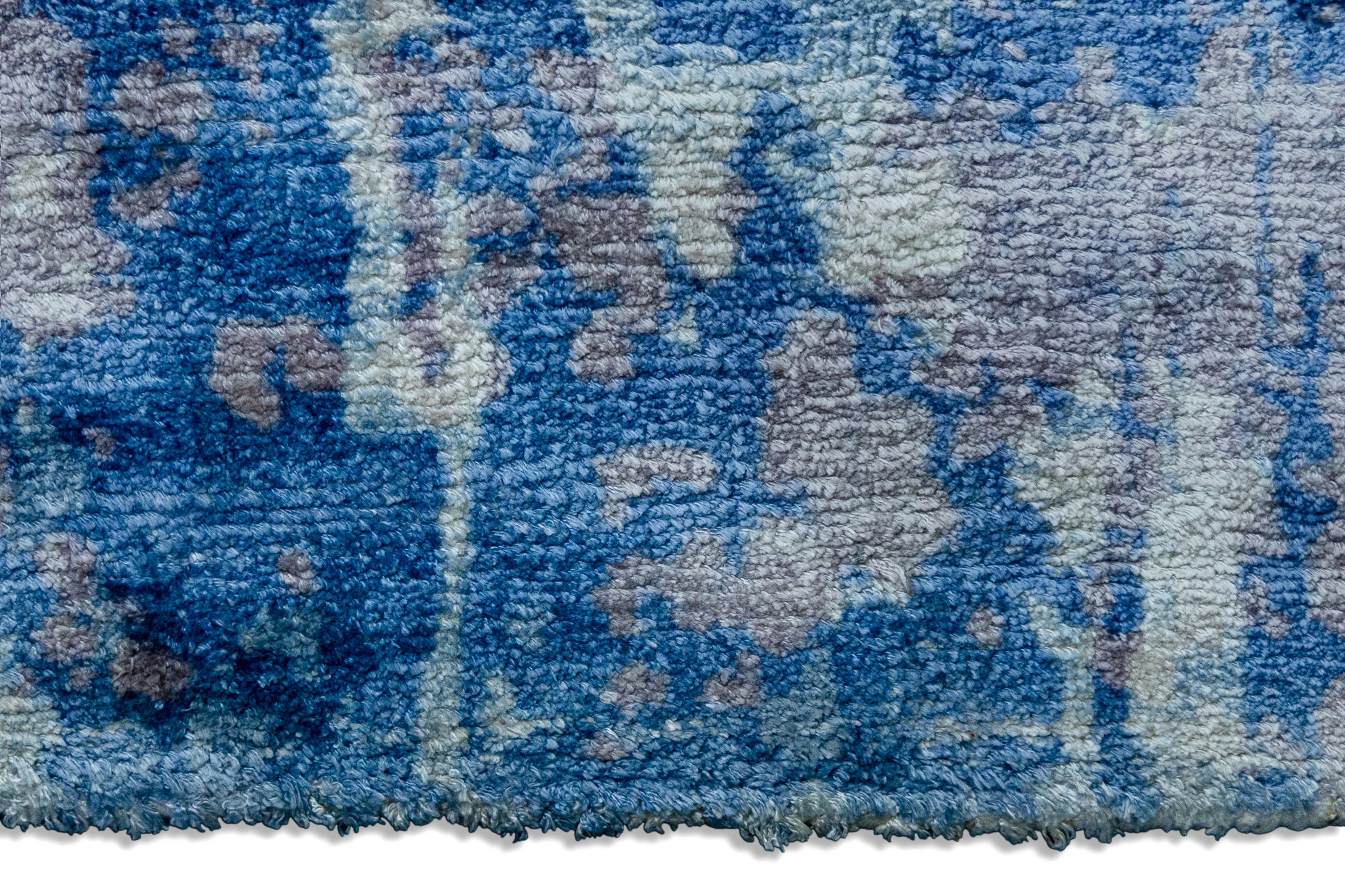 Detail Shot of Blue Hand-Loom Printed Viscose Handmade Rug for bed rooms, offices, and dining spaces