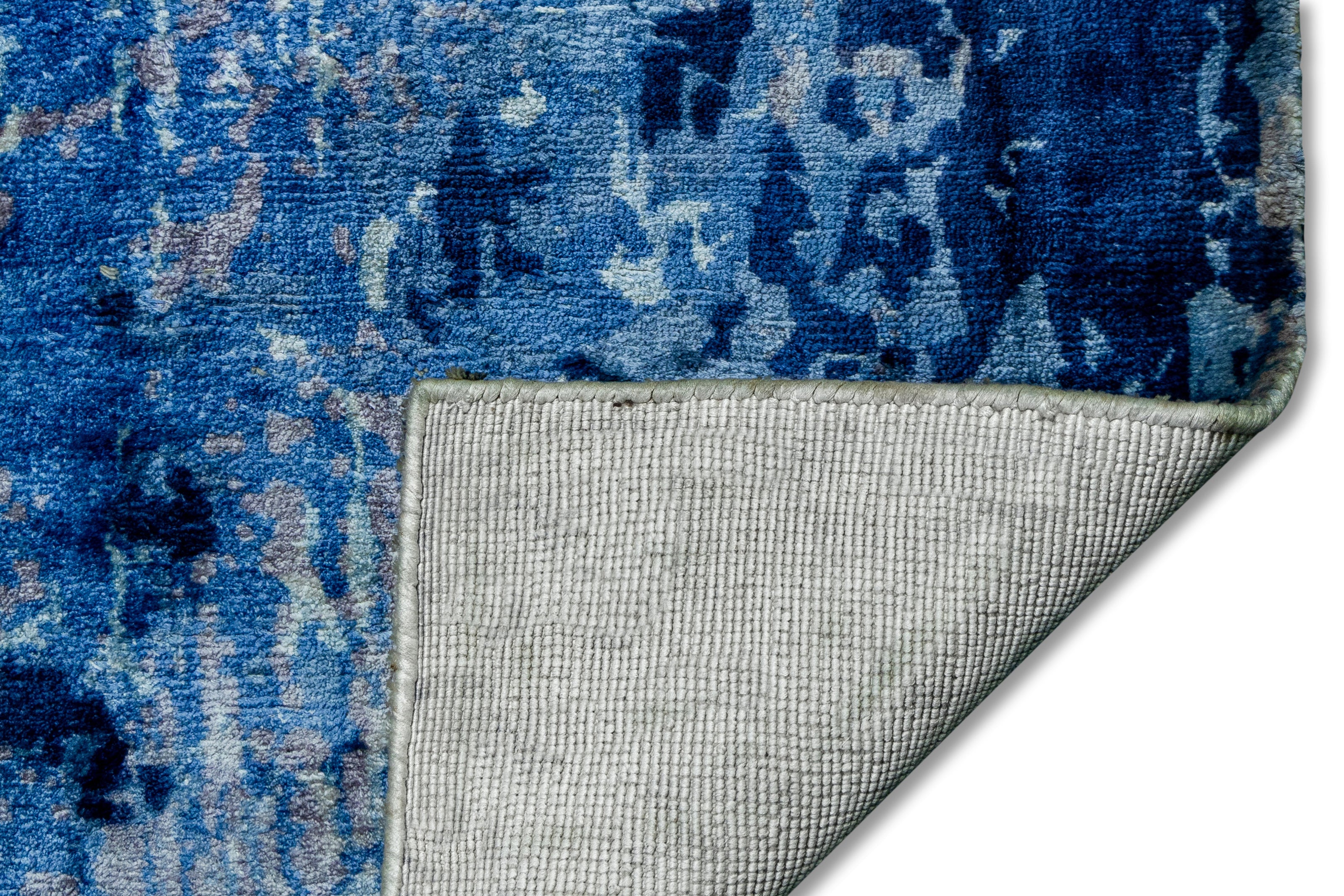 Detail Shot of Blue Hand-Loom Printed Viscose Handmade Rug for bed rooms, offices, and dining spaces