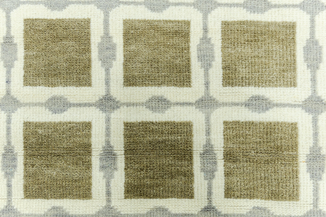 Detail Shot of Patterned Rug with Green Beige Squares Hand-Knotted New Zealand Wool Handmade Rug for bed rooms, offices, and dining spaces