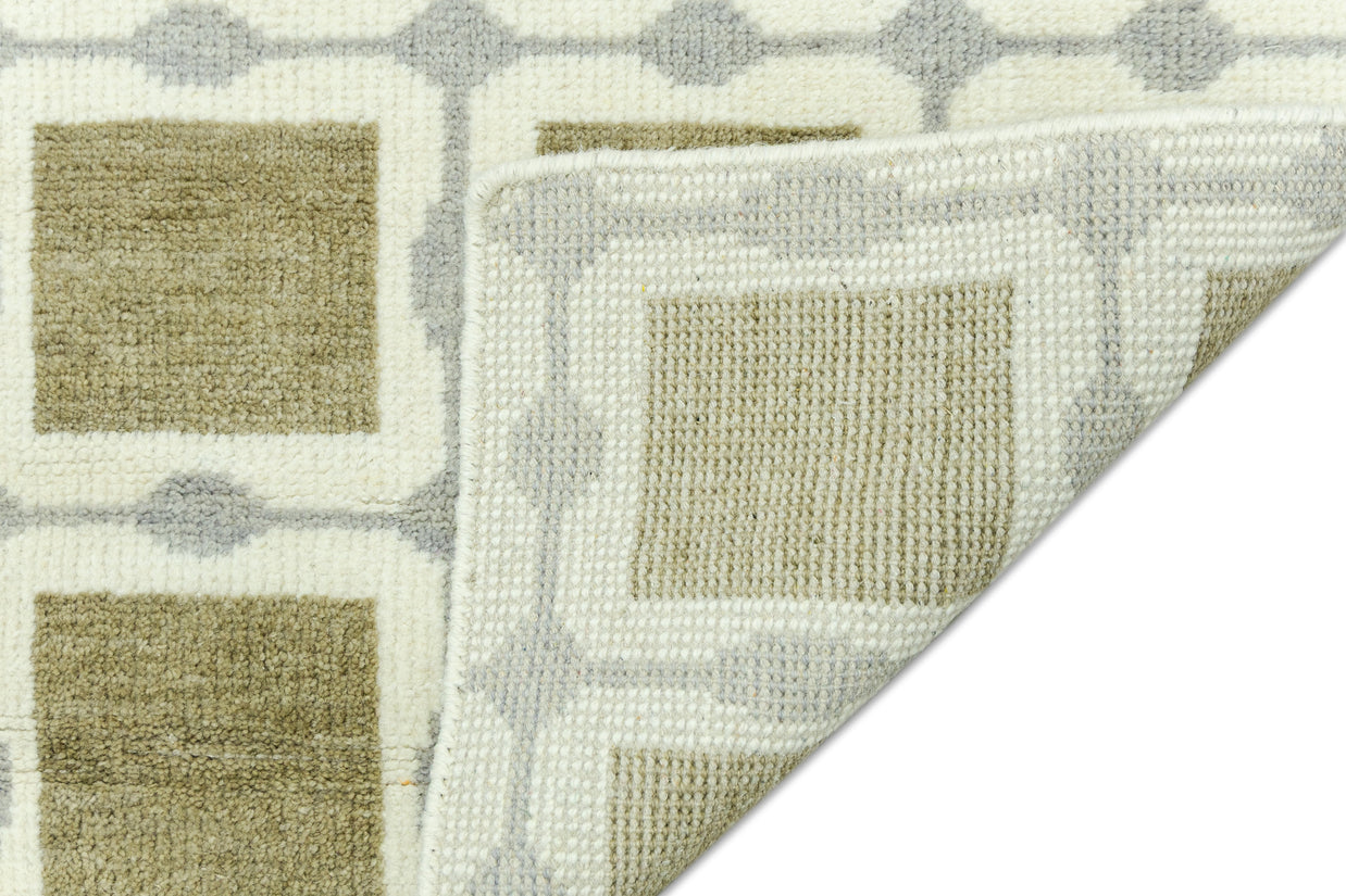 Detail Shot of Patterned Rug with Green Beige Squares Hand-Knotted New Zealand Wool Handmade Rug for bed rooms, offices, and dining spaces