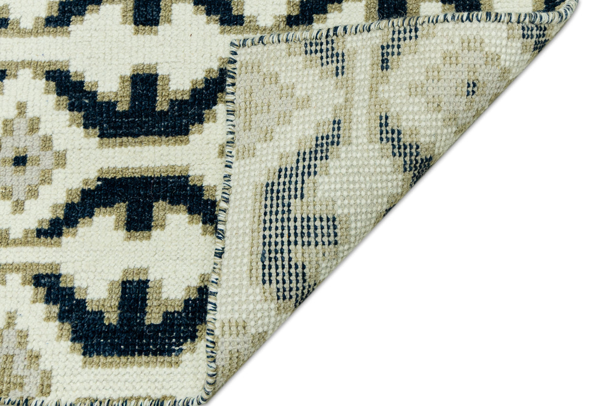 Detail Shot of Blue and White Geometrical pattern Hand-Knotted New Zealand Wool Handmade Rug for bed rooms, offices, and dining spaces