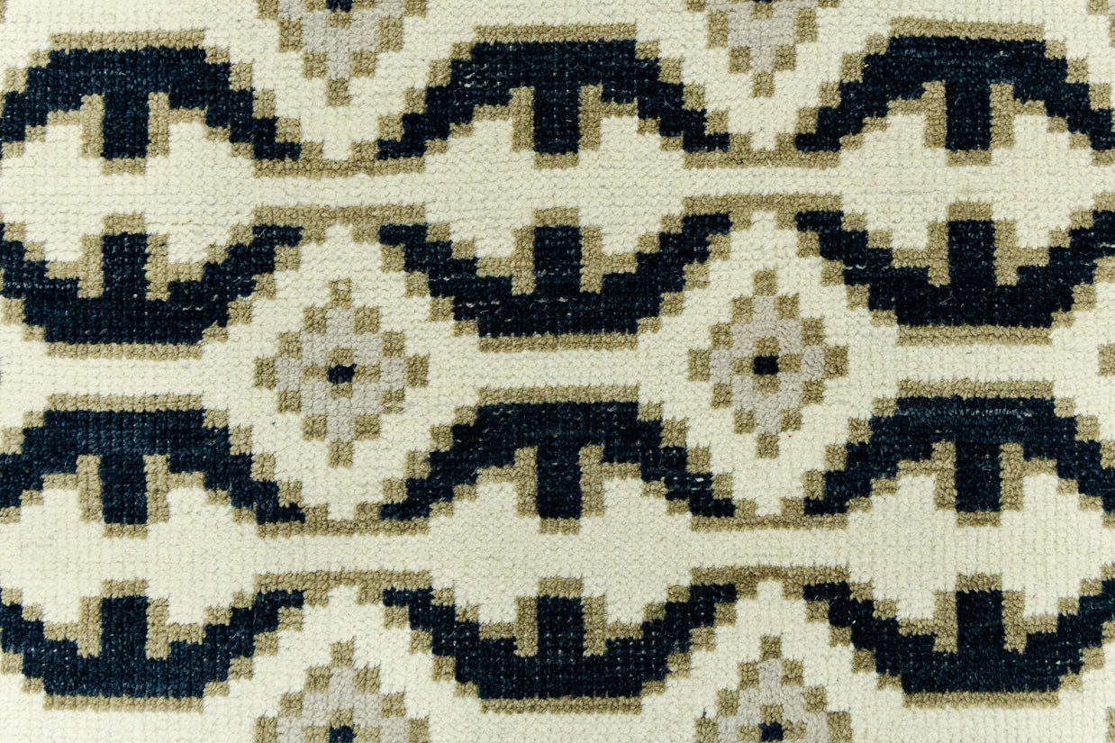 Detail Shot of Blue and White Geometrical pattern Hand-Knotted New Zealand Wool Handmade Rug for bed rooms, offices, and dining spaces