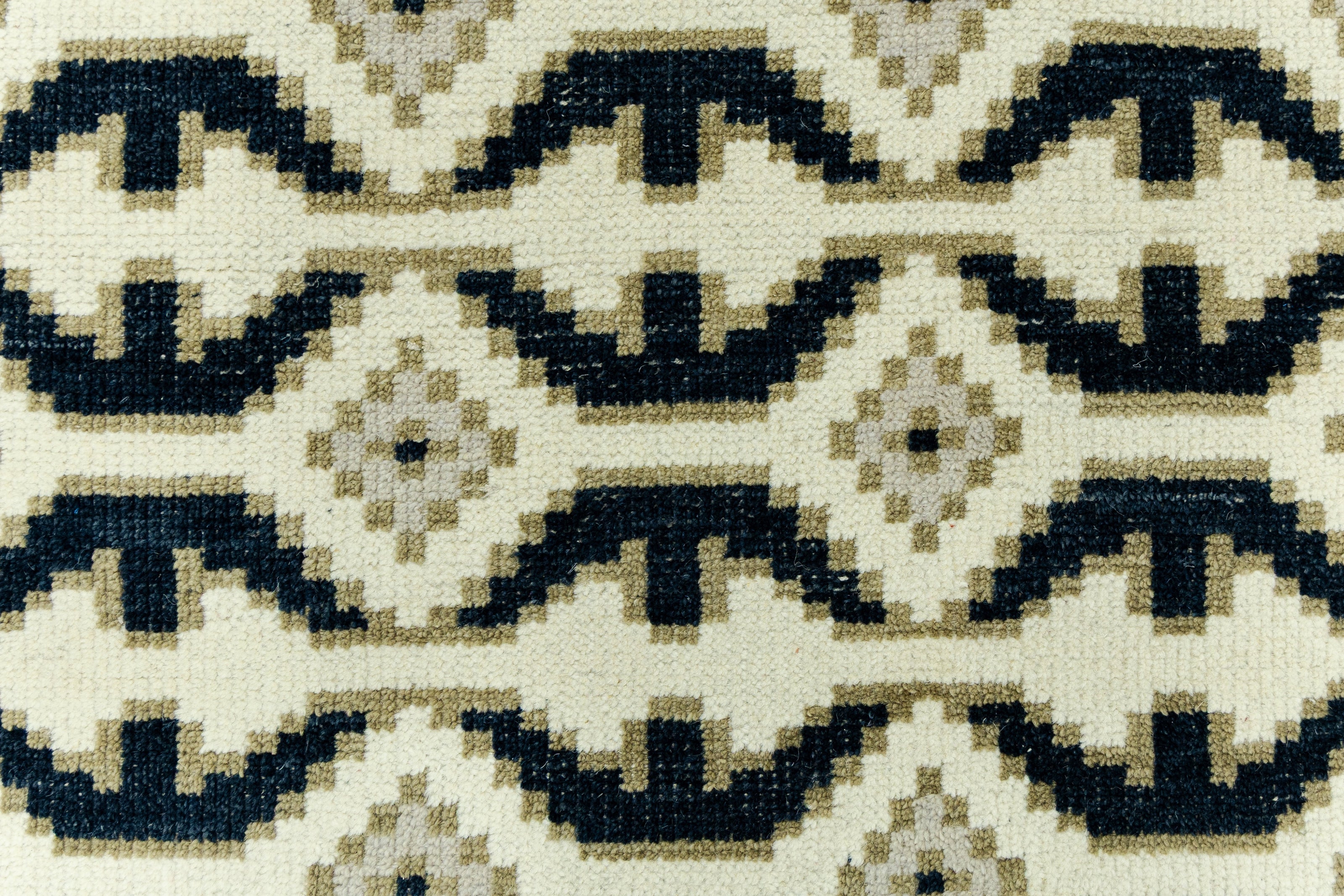 Detail Shot of Blue and White Geometrical pattern Hand-Knotted New Zealand Wool Handmade Rug for bed rooms, offices, and dining spaces