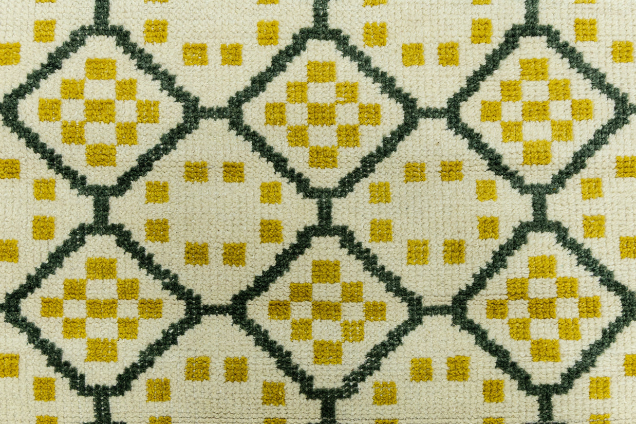 Detail Shot of Geometrical Design with Patterned Hand-Knotted New Zealand Wool Rug for living rooms, offices, and dining spaces. 