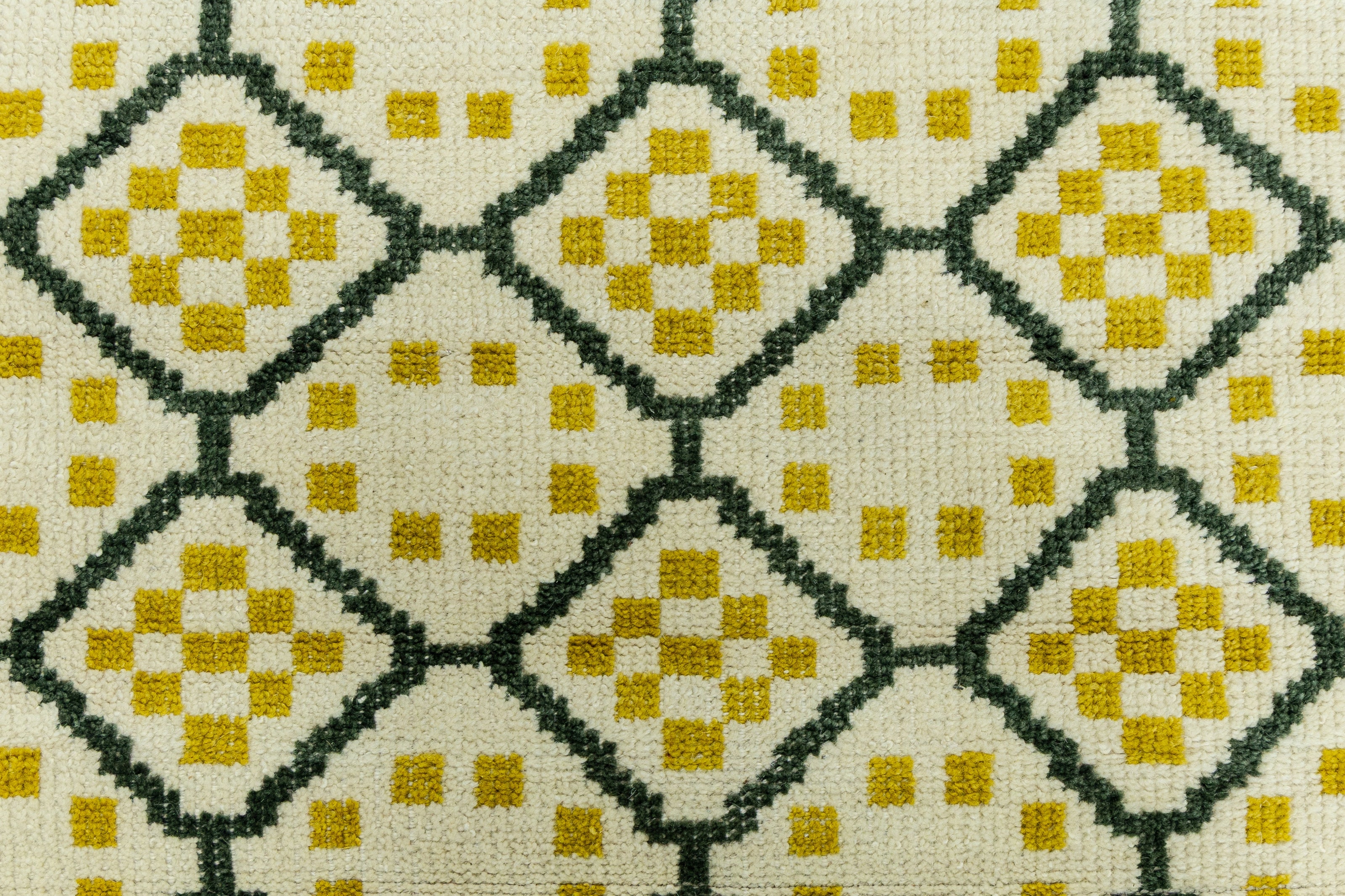Detail Shot of Geometrical Design with Patterned Hand-Knotted New Zealand Wool Rug for living rooms, offices, and dining spaces. 
