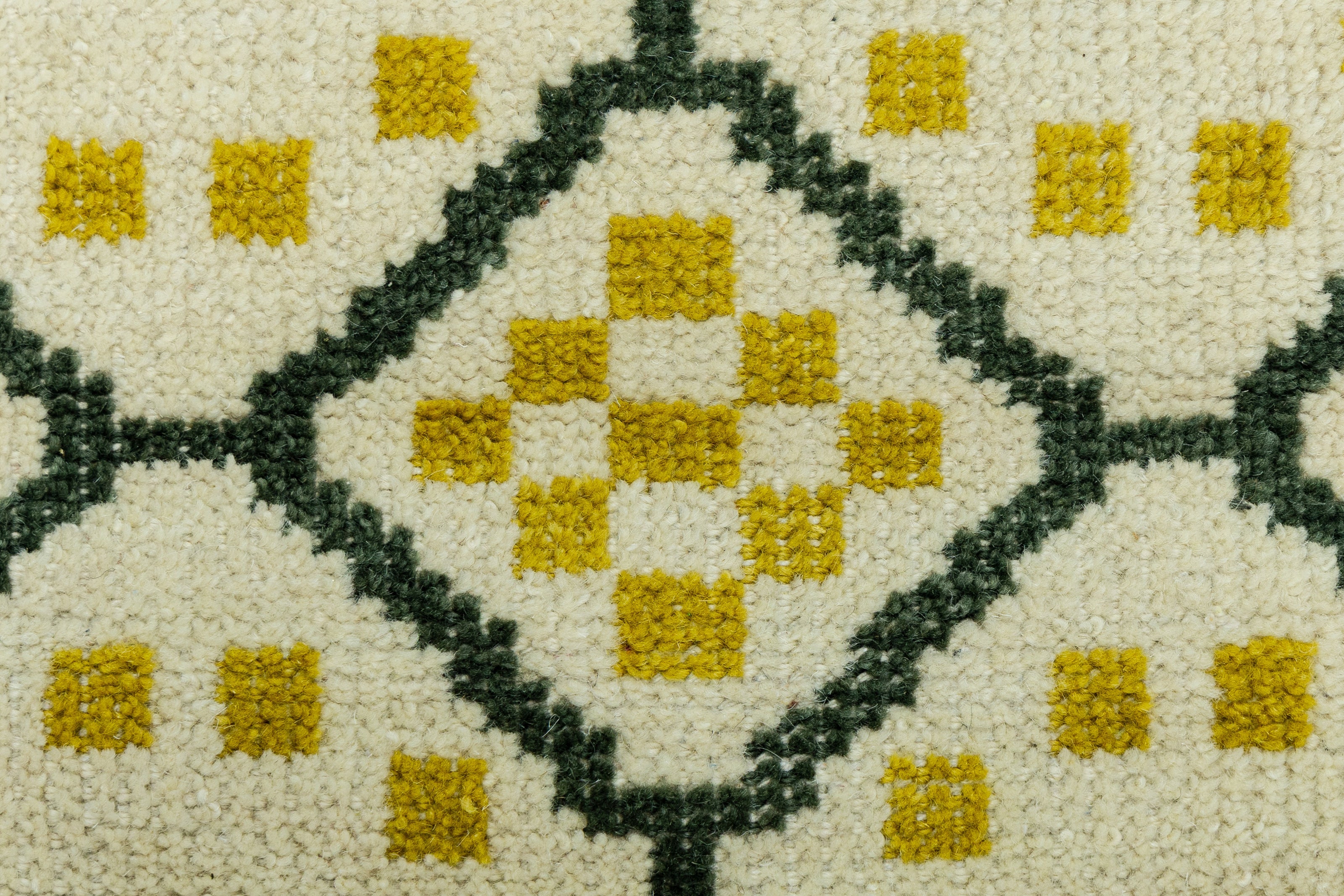 Detail Shot of Geometrical Design with Patterned Hand-Knotted New Zealand Wool Rug for living rooms, offices, and dining spaces. 