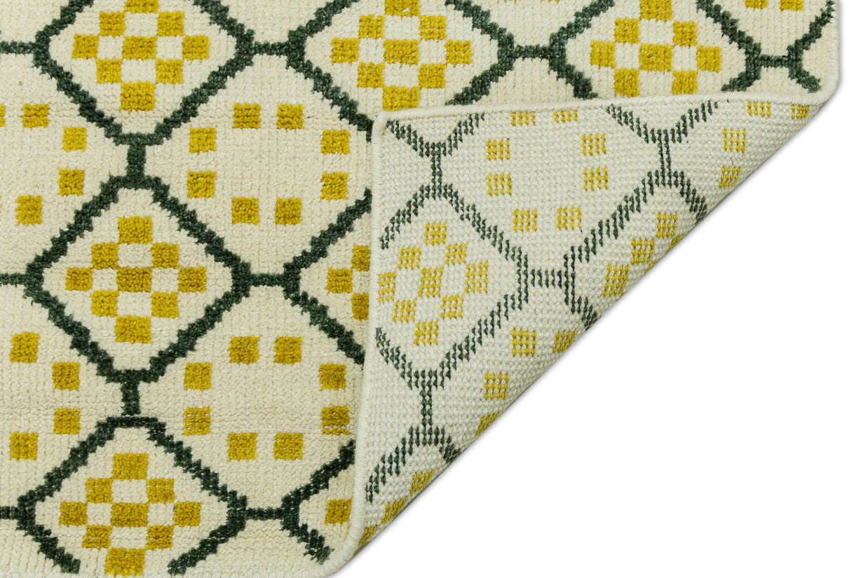 Detail Shot of Geometrical Design with Patterned Hand-Knotted New Zealand Wool Rug for living rooms, offices, and dining spaces. 