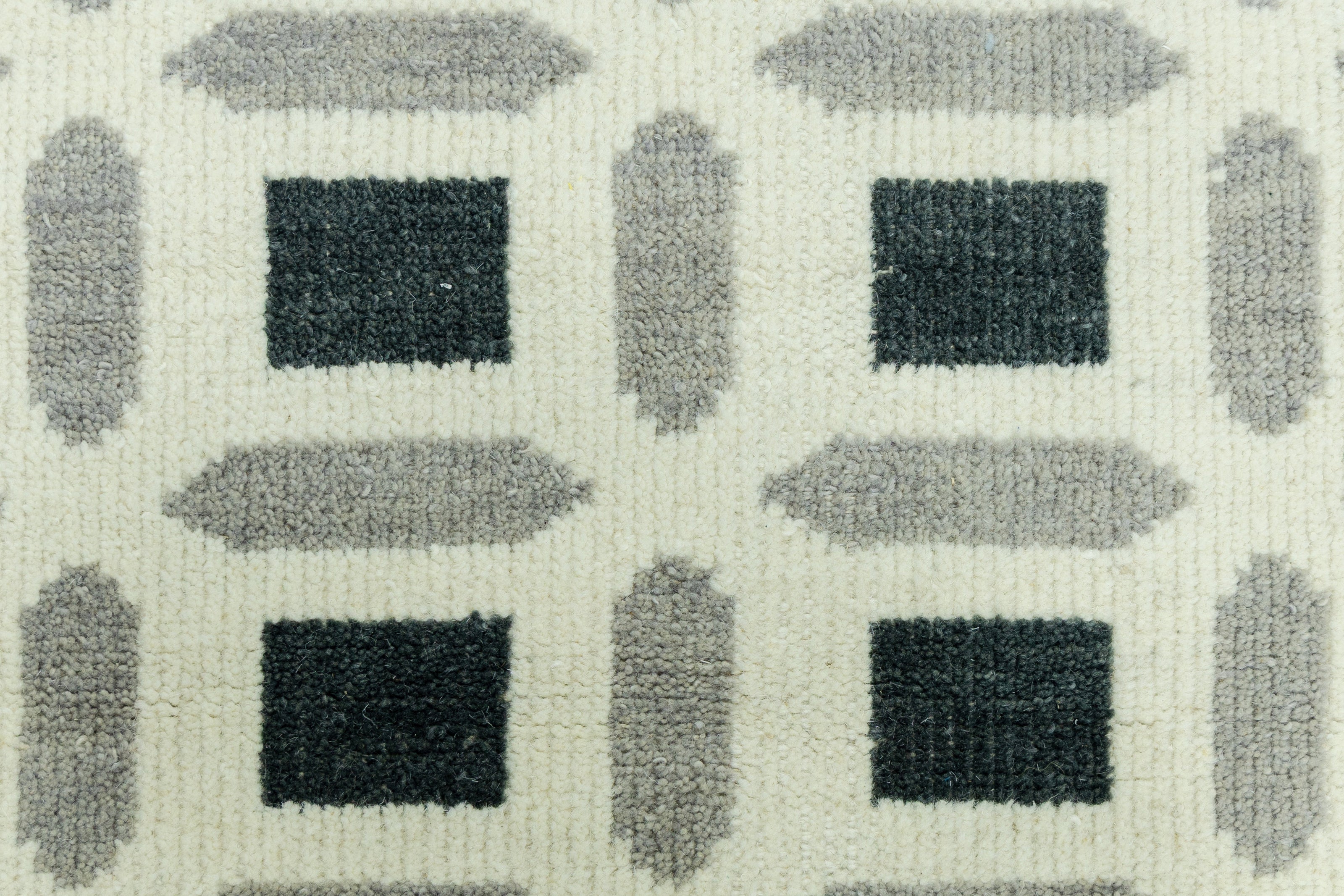 Detail Shot of Patterned Rug with Geometrical Design Hand-Knotted New Zealand Wool Handmade Rug for bed rooms, offices, and dining spaces