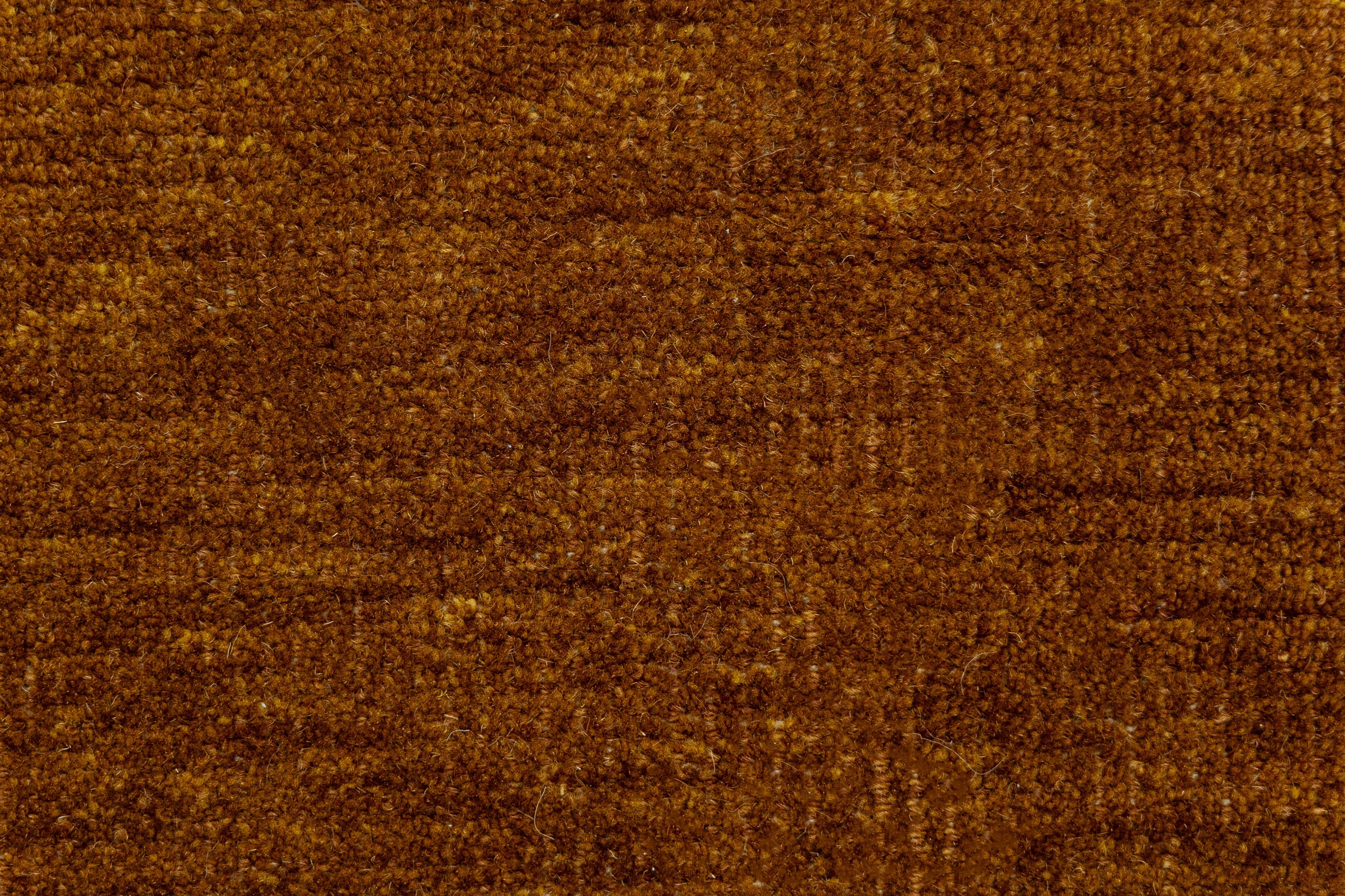 Detail Shot of Textured Pattern Brown Hand-Knotted Indian Wool Handmade Rug for living rooms, offices, and dining spaces