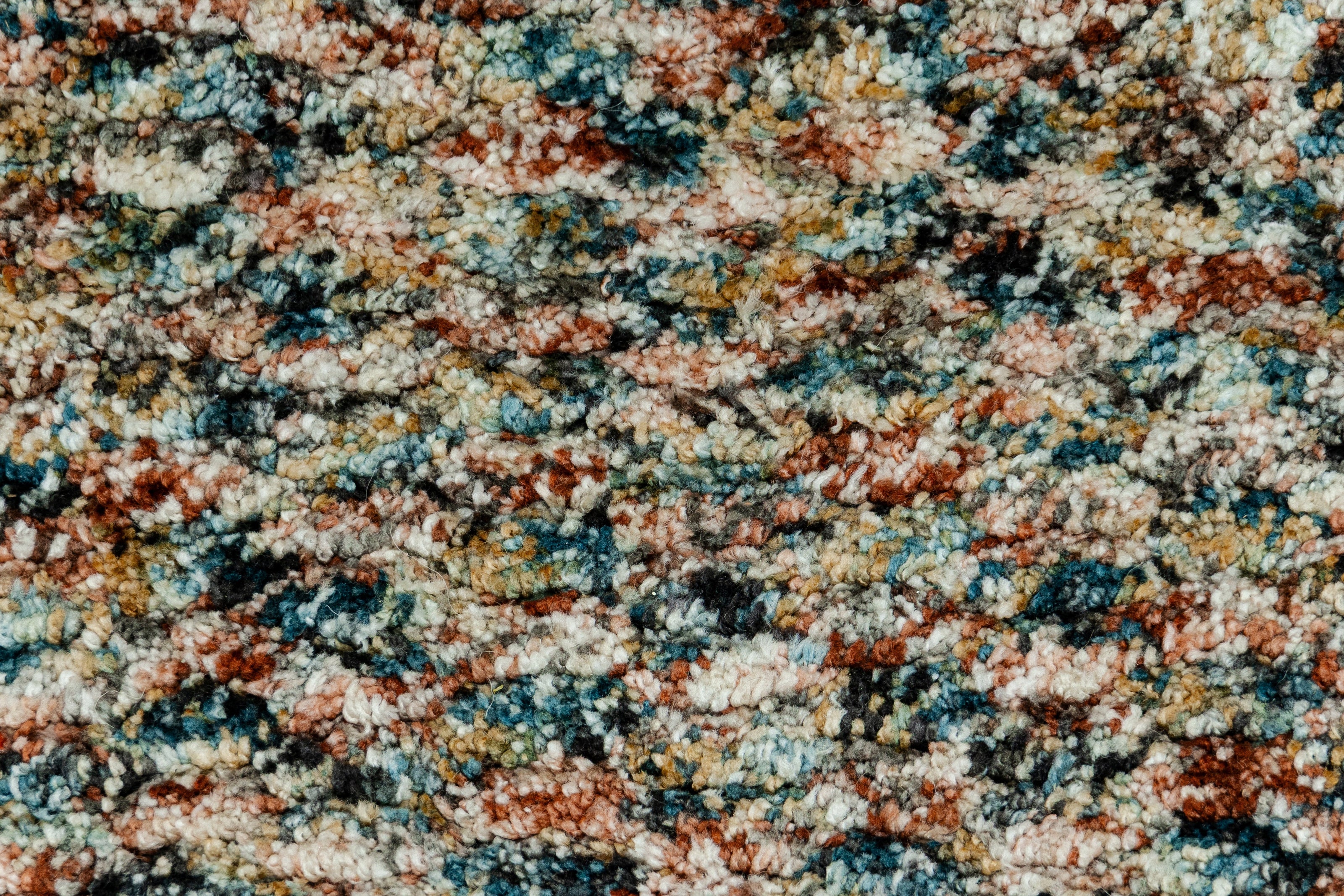 Detail Shot of Multicolour Textuted Hand-Loom Woolen Handmade Rug for bed rooms, offices, and dining spaces. 