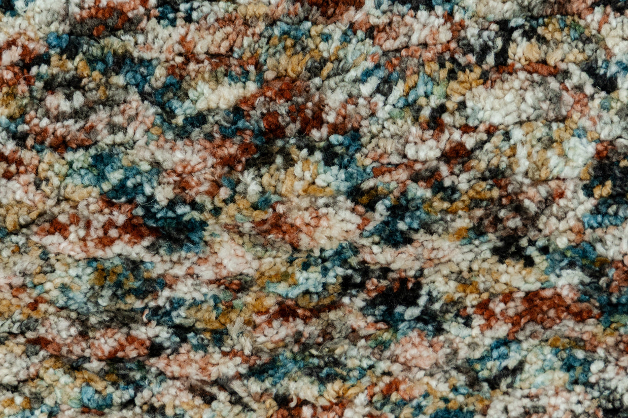 Detail Shot of Multicolour Textuted Hand-Loom Woolen Handmade Rug for bed rooms, offices, and dining spaces. 