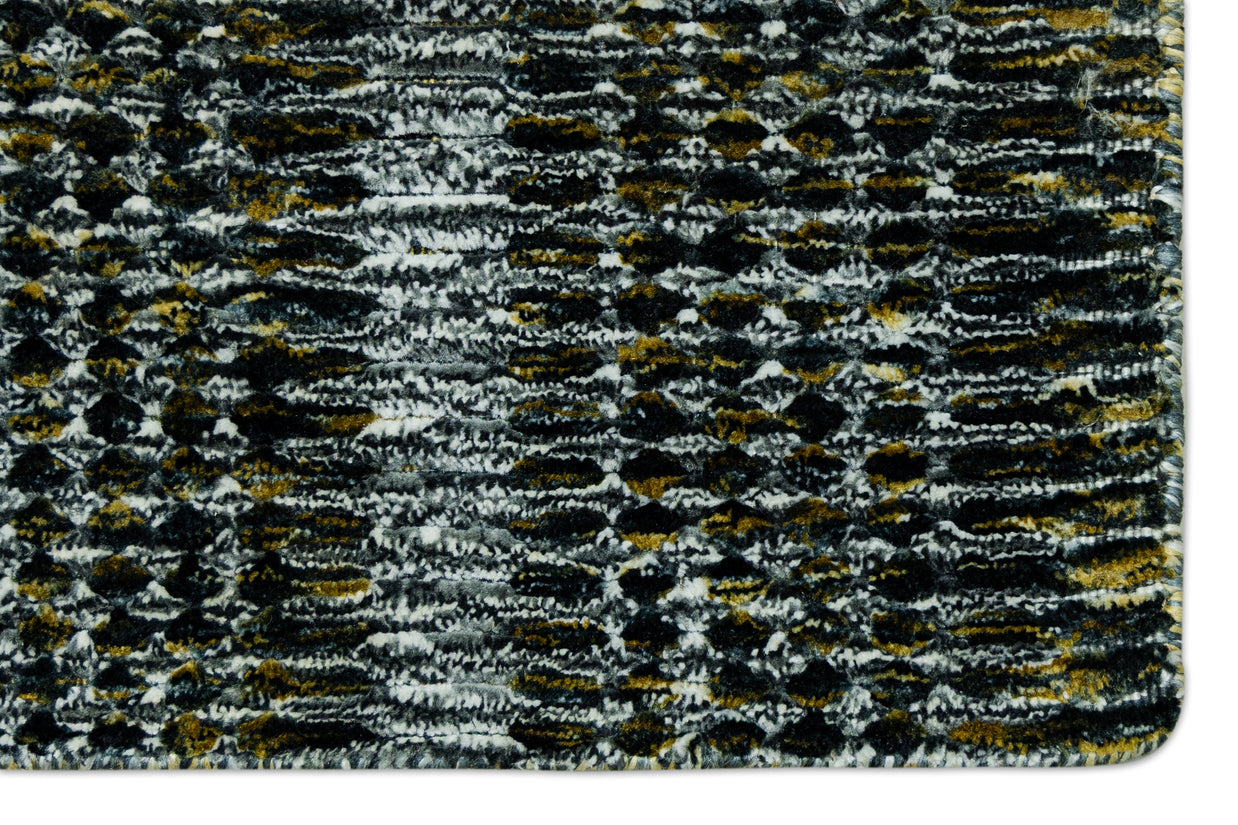 Detail Shot of Textured Blue and Black Pattern Hand-Loom Woolen Handmade Rug for bed rooms, offices, and dining spaces. 