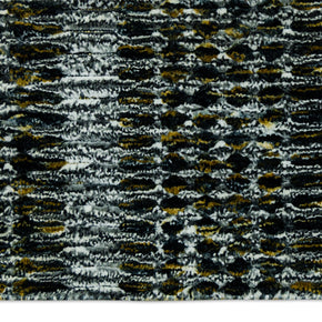 Detail Shot of Textured Blue and Black Pattern Hand-Loom Woolen Handmade Rug for bed rooms, offices, and dining spaces. 