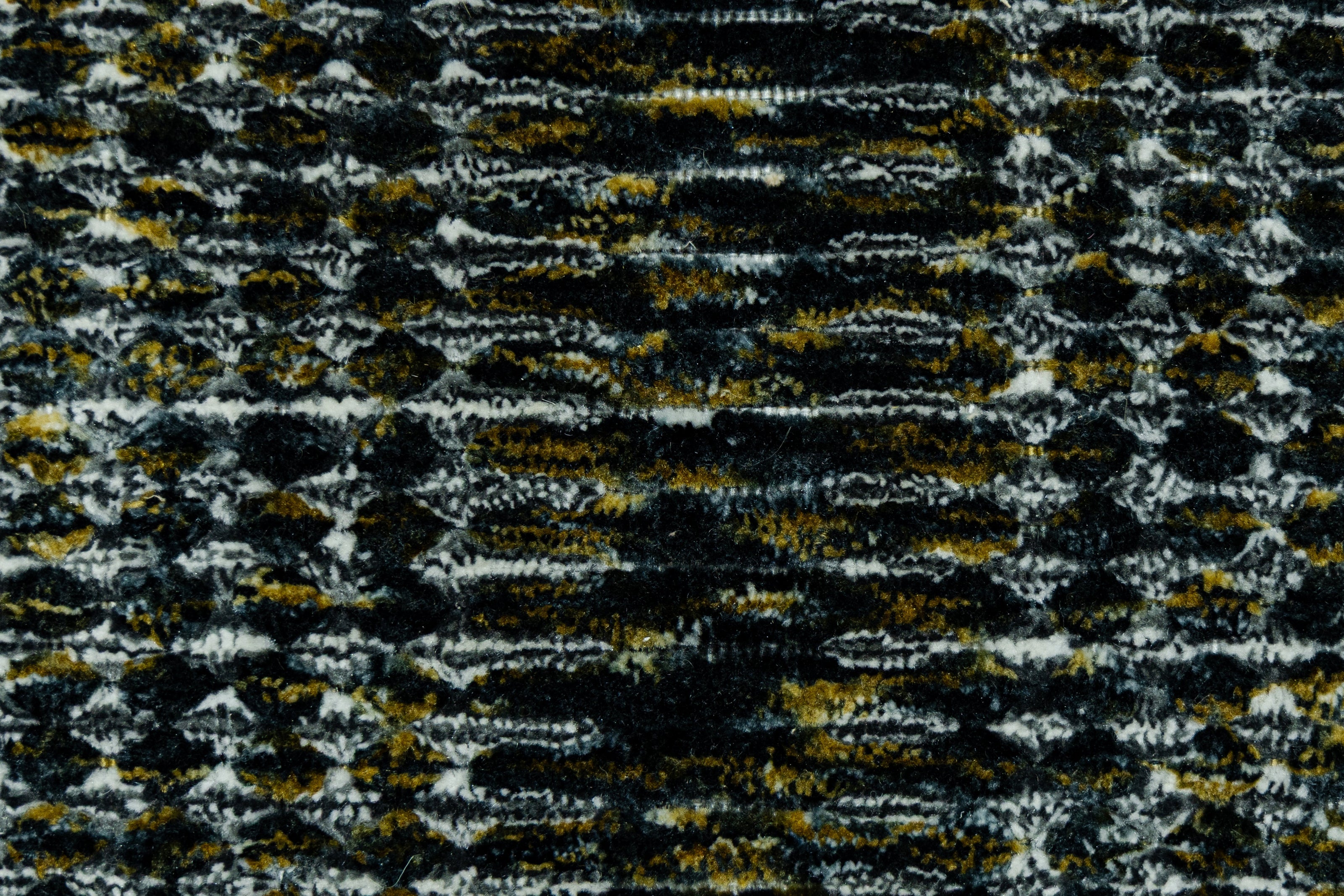 Detail Shot of Textured Blue and Black Pattern Hand-Loom Woolen Handmade Rug for bed rooms, offices, and dining spaces. 