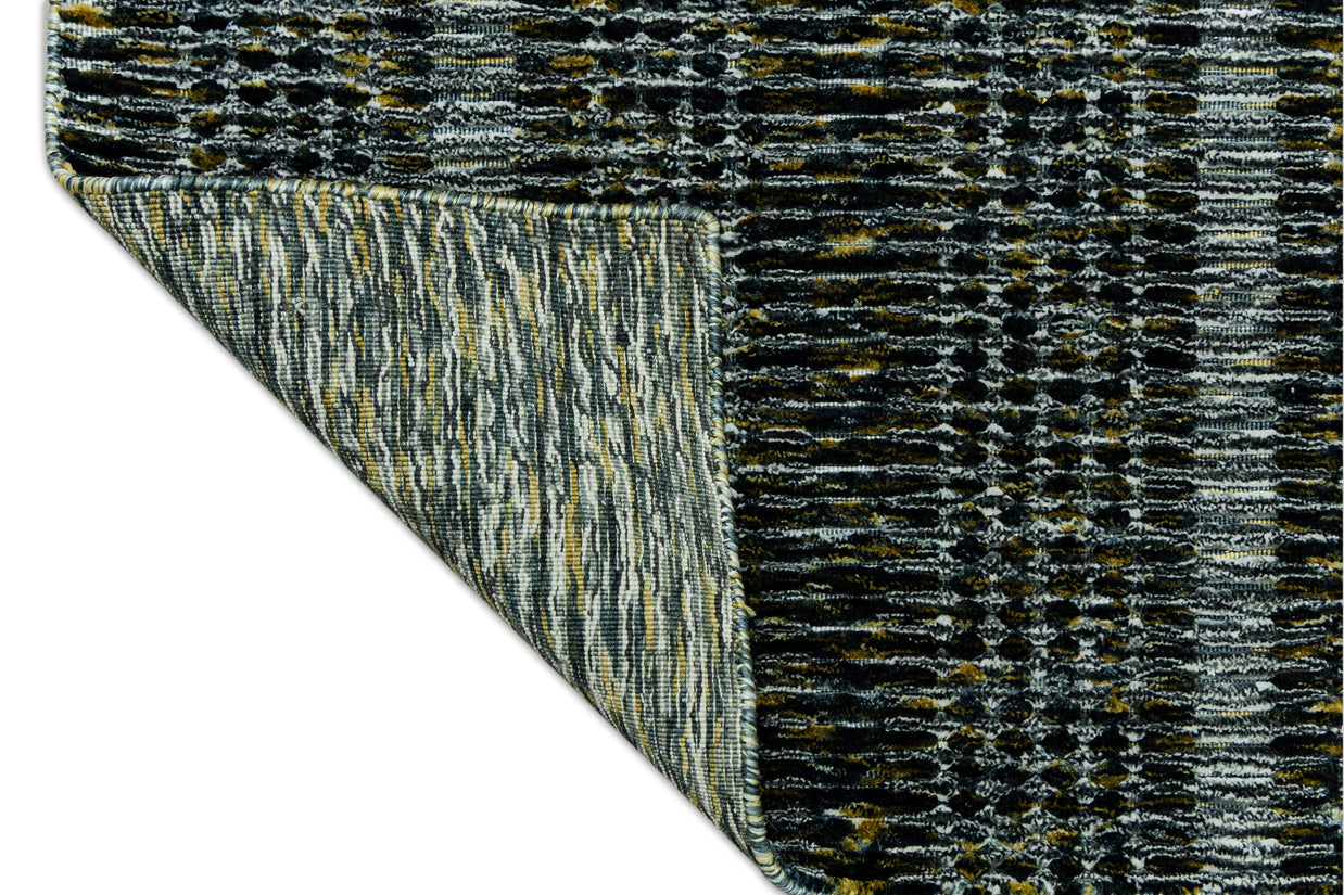 Detail Shot of Textured Blue and Black Pattern Hand-Loom Woolen Handmade Rug for bed rooms, offices, and dining spaces. 