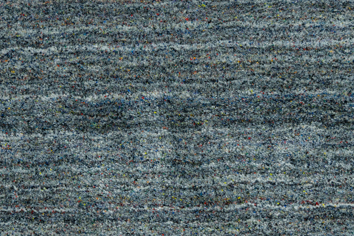 Detail Shot of Hand-Loom Woolen Handmade Rug for bed rooms, offices, and dining spaces. 