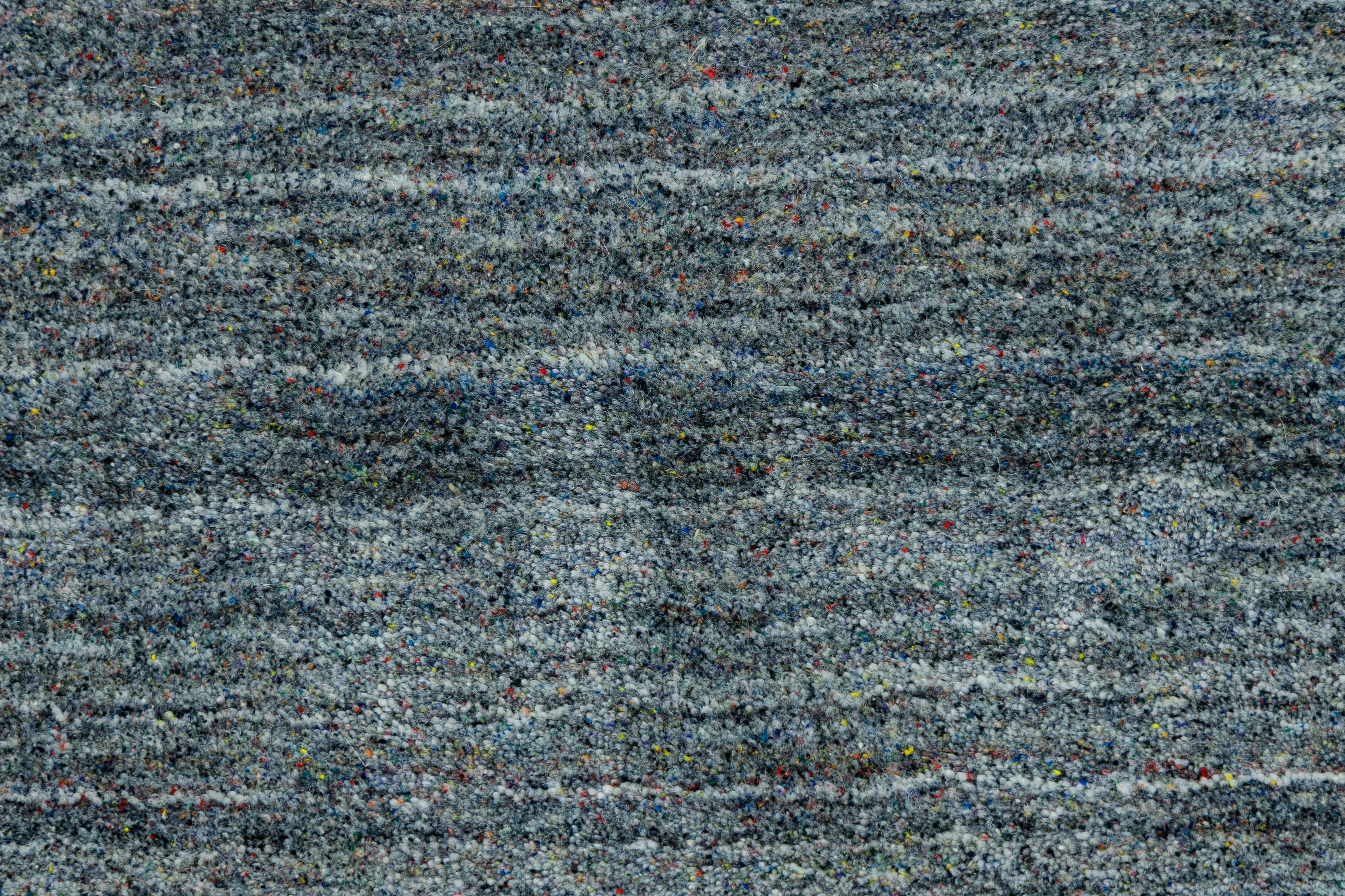 Detail Shot of Hand-Loom Woolen Handmade Rug for bed rooms, offices, and dining spaces. 