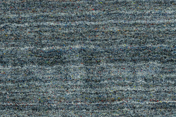 Detail Shot of Hand-Loom Woolen Handmade Rug for bed rooms, offices, and dining spaces. 