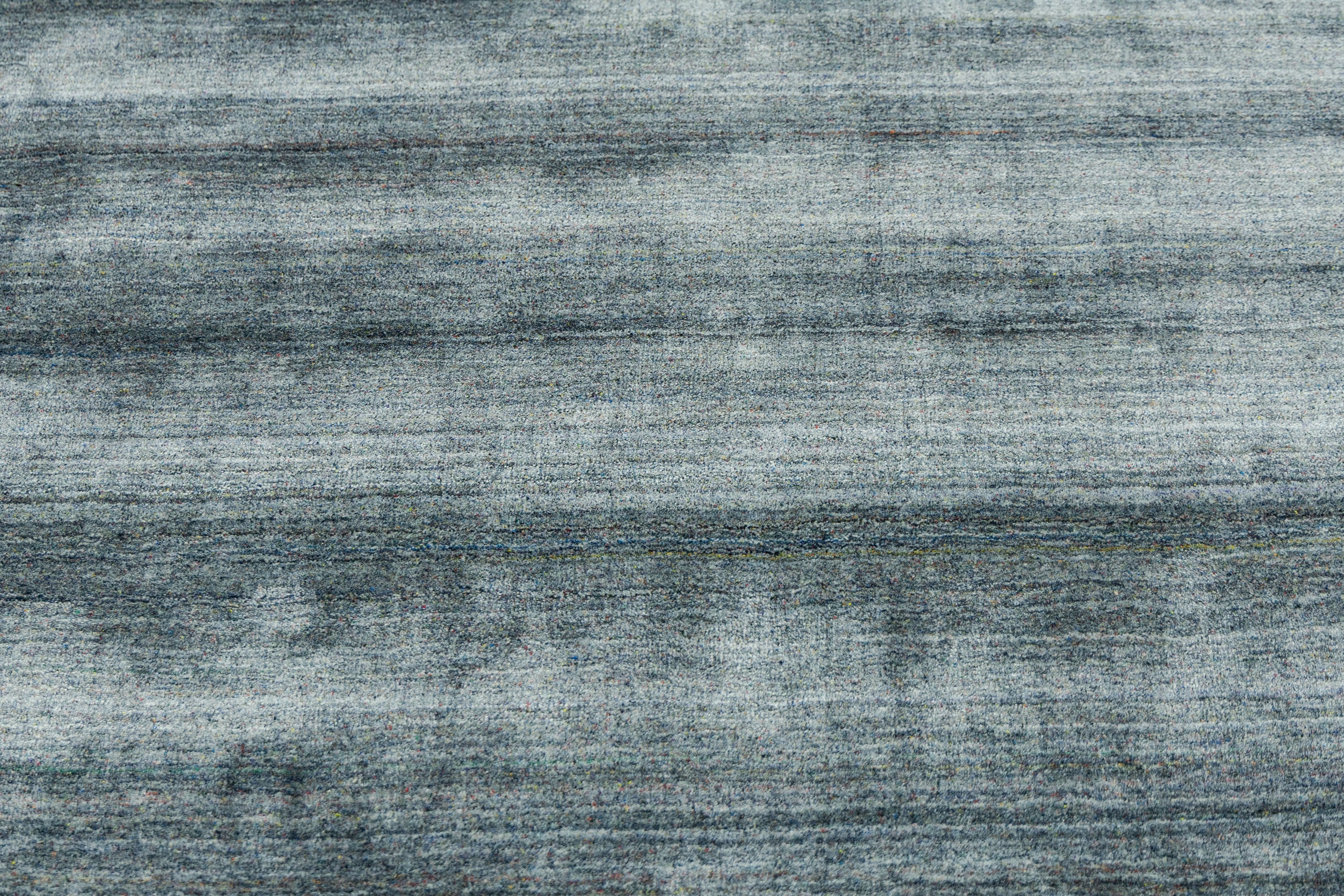 Detail Shot of Hand-Loom Woolen Handmade Rug for bed rooms, offices, and dining spaces. 