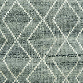 Detail Shot of Blue Geometric Patterned Hand-Loom Viscose Handmade Rug for bed rooms, offices, and dining spaces. 