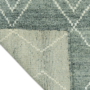 Detail Shot of Blue Geometric Patterned Hand-Loom Viscose Handmade Rug for bed rooms, offices, and dining spaces. 