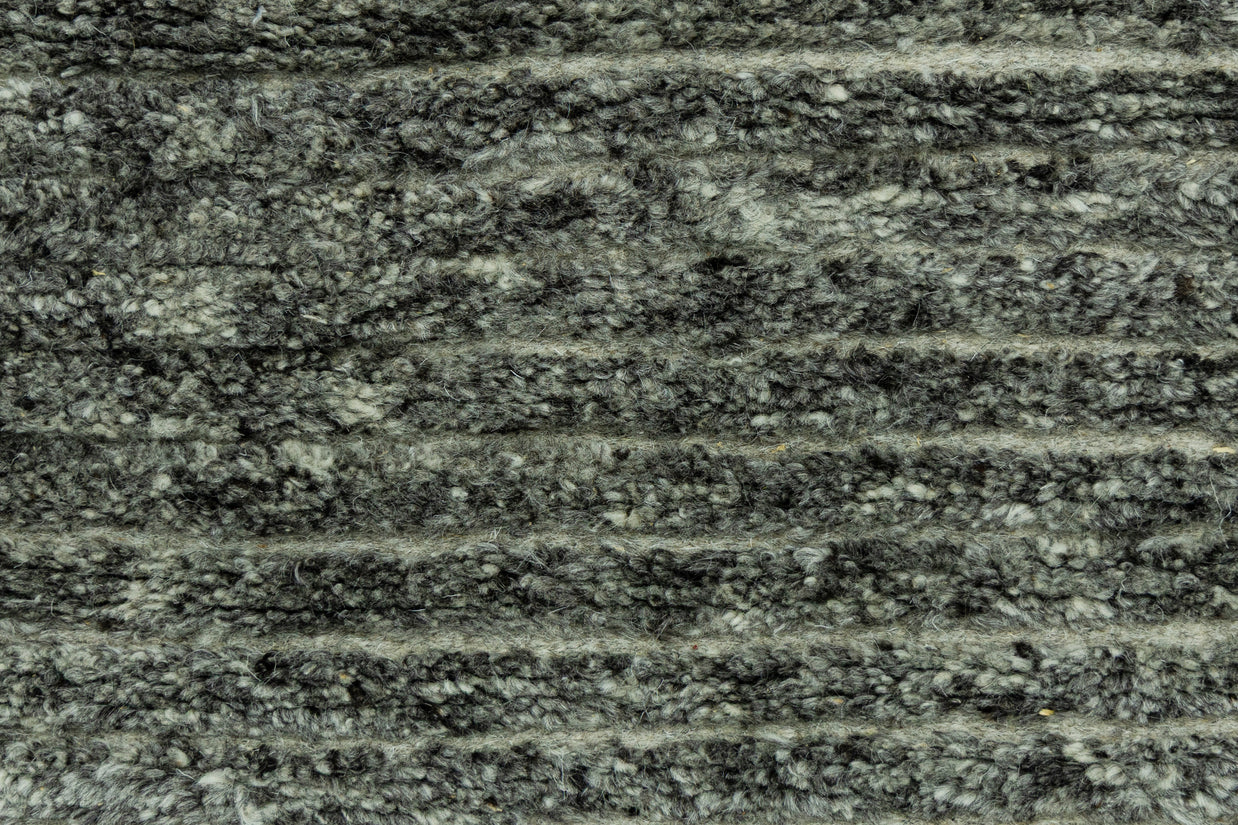 Detail Shot of Textured Grey Hand-Knotted Indian Wool Handmade Rug for living rooms, offices, and dining spaces