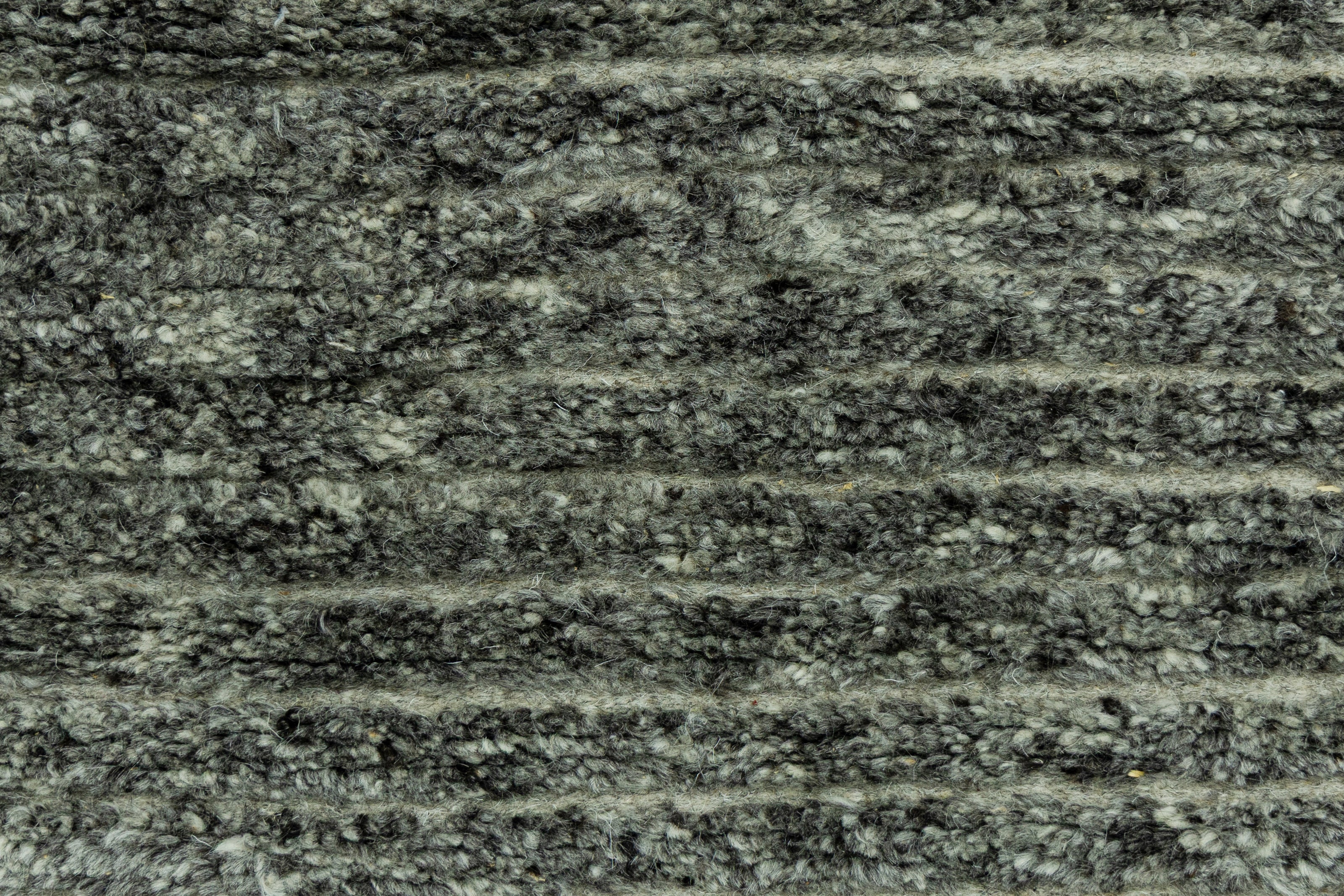 Detail Shot of Textured Grey Hand-Knotted Indian Wool Handmade Rug for living rooms, offices, and dining spaces