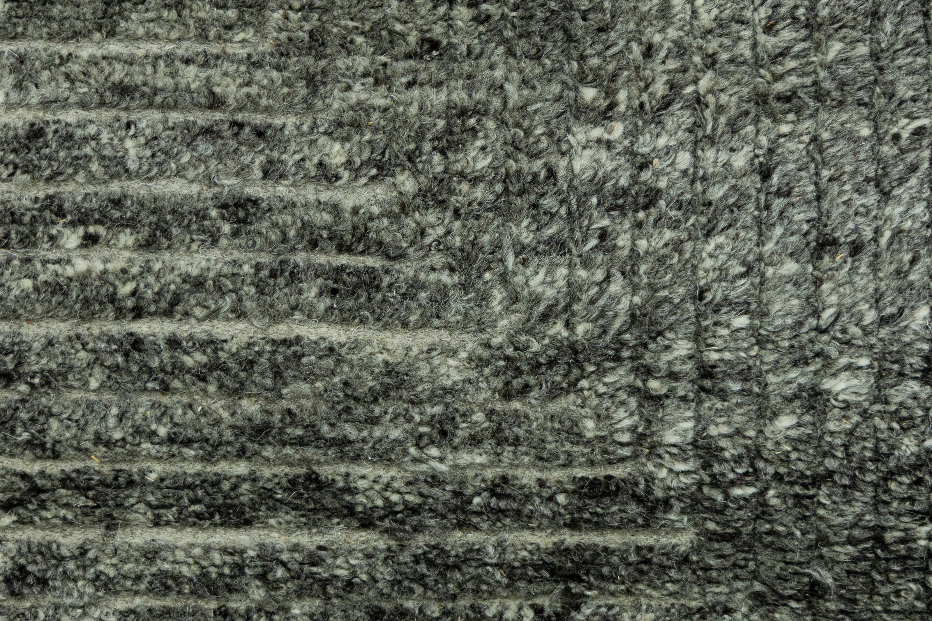 Detail Shot of Textured Grey Hand-Knotted Indian Wool Handmade Rug for living rooms, offices, and dining spaces