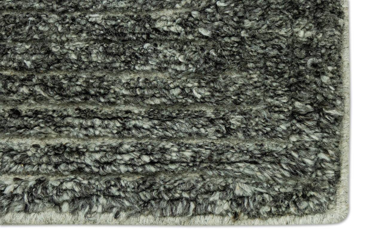 Detail Shot of Textured Grey Hand-Knotted Indian Wool Handmade Rug for living rooms, offices, and dining spaces