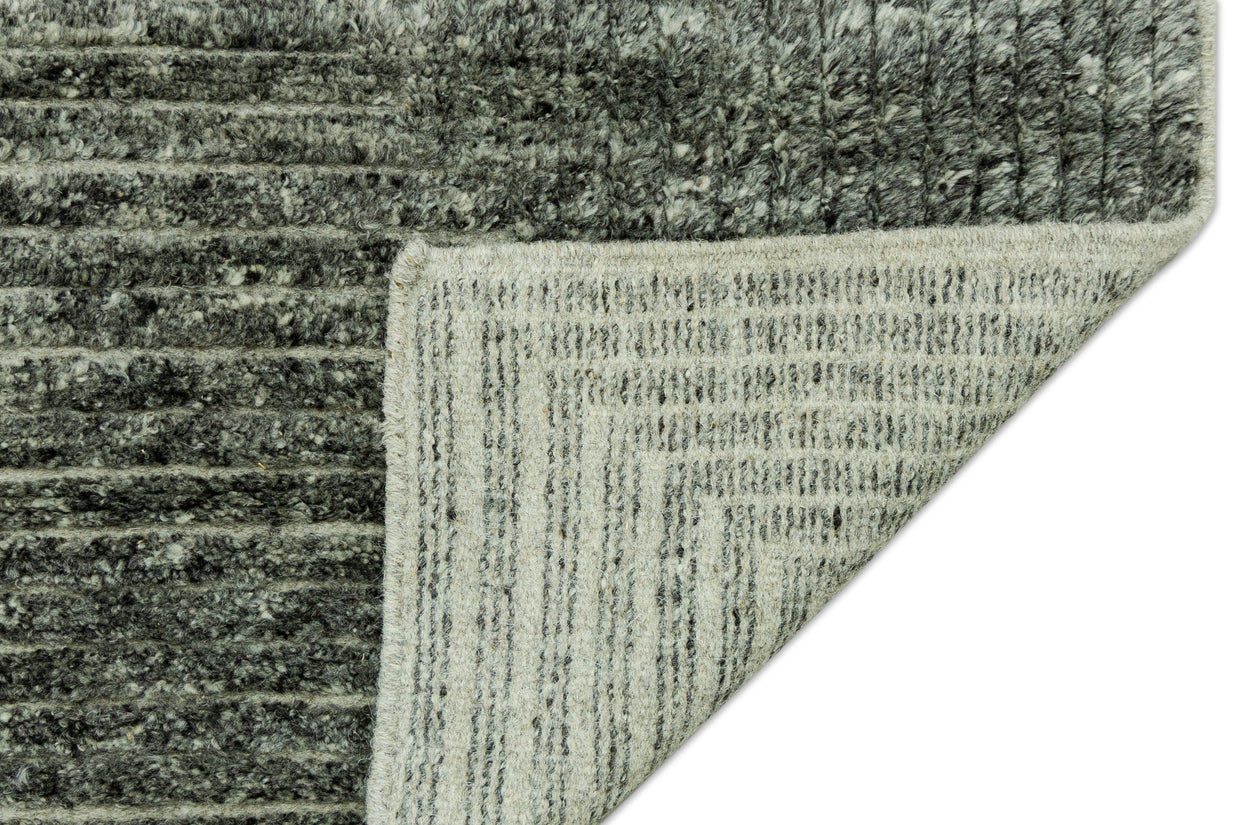 Detail Shot of Textured Grey Hand-Knotted Indian Wool Handmade Rug for living rooms, offices, and dining spaces