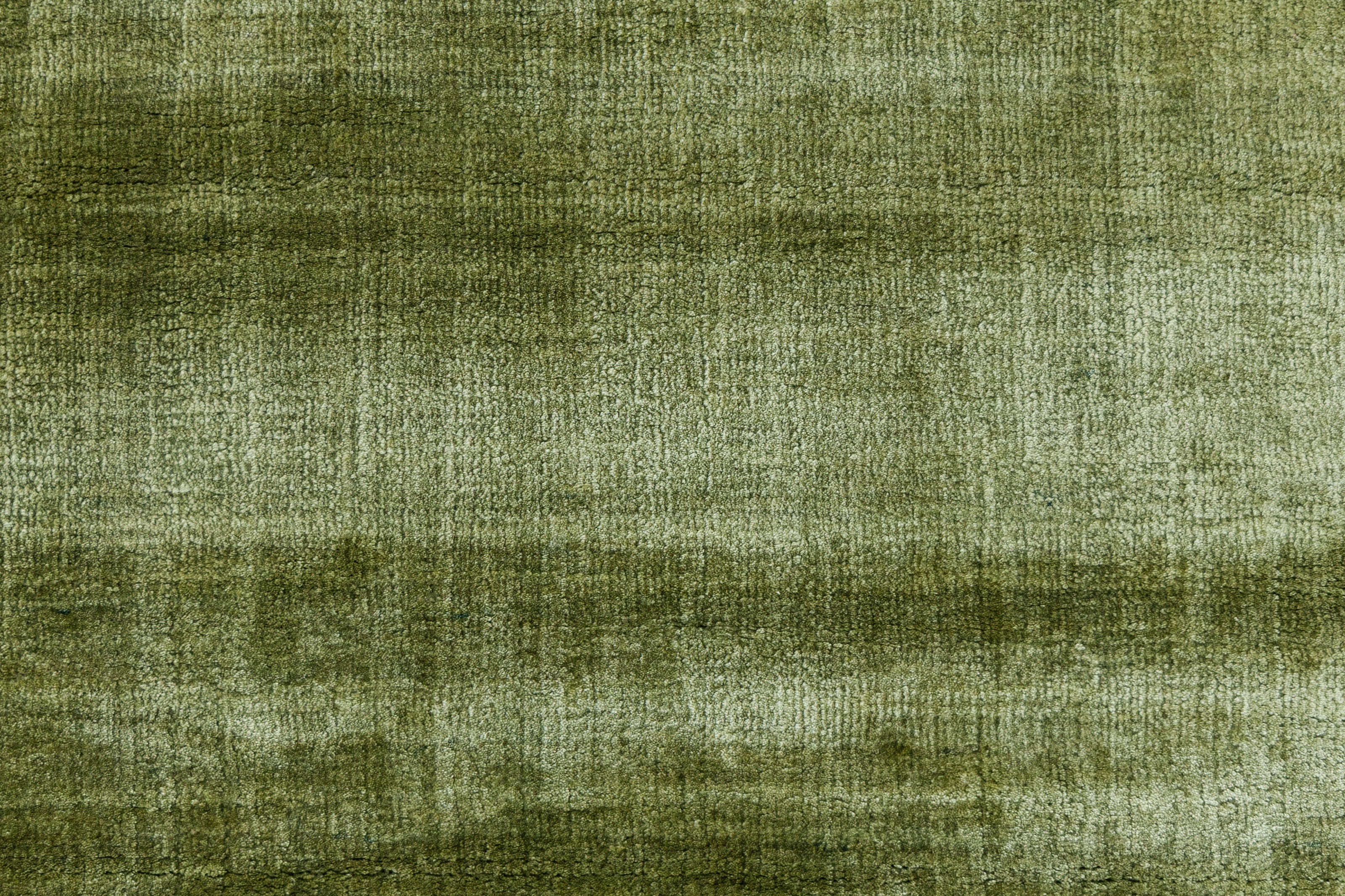 Detail Shot of Textured Green Hand-Loom Viscose Handmade Printed Rug for bed rooms, offices, and dining spaces
