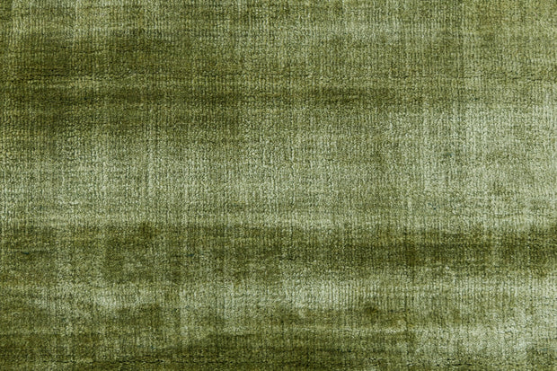 Detail Shot of Textured Green Hand-Loom Viscose Handmade Printed Rug for bed rooms, offices, and dining spaces