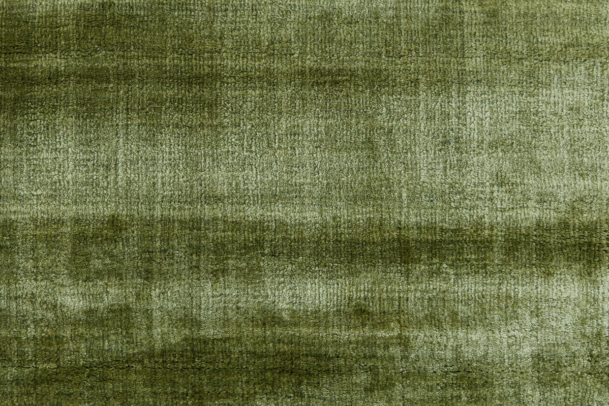 Detail Shot of Textured Green Hand-Loom Viscose Handmade Printed Rug for bed rooms, offices, and dining spaces