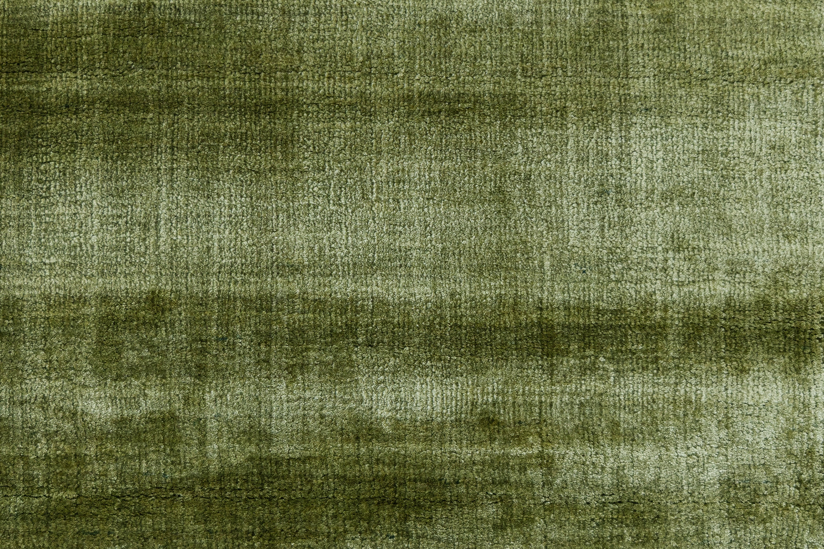 Detail Shot of Textured Green Hand-Loom Viscose Handmade Printed Rug for bed rooms, offices, and dining spaces