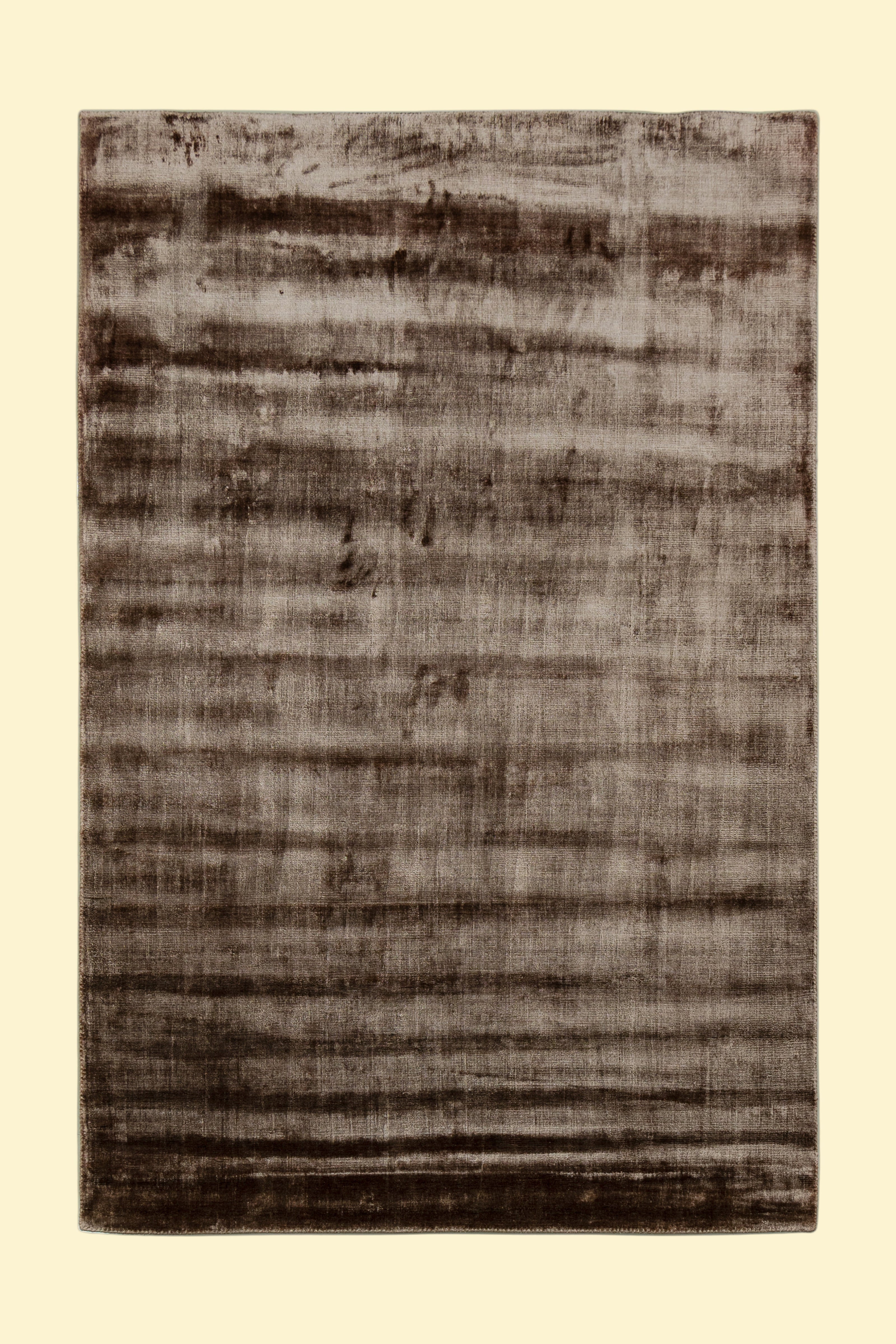 Textured Brown and Beige Hand-Loom Woolen Handmade Rug for bed rooms, offices, and dining spaces. 